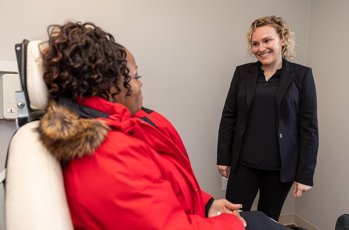 Consulting with patient in the office Consulting with patient in the office