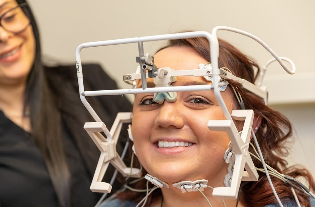 A patient with TMJ disorder in Westchester, NY wears a device helpful in diagnosing the jaw joint